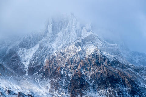 Snowstorm Enveloping Majestic Peaks