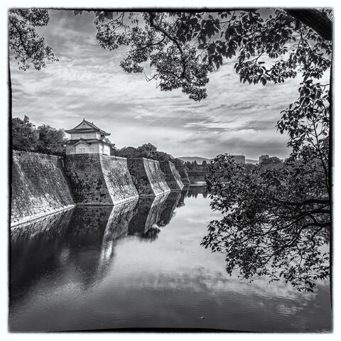 Osaka Castle's Reflective Embrace