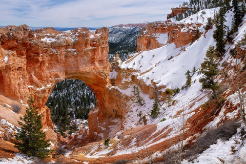 Snowfall at Natural Bridge in Bryce Canyon