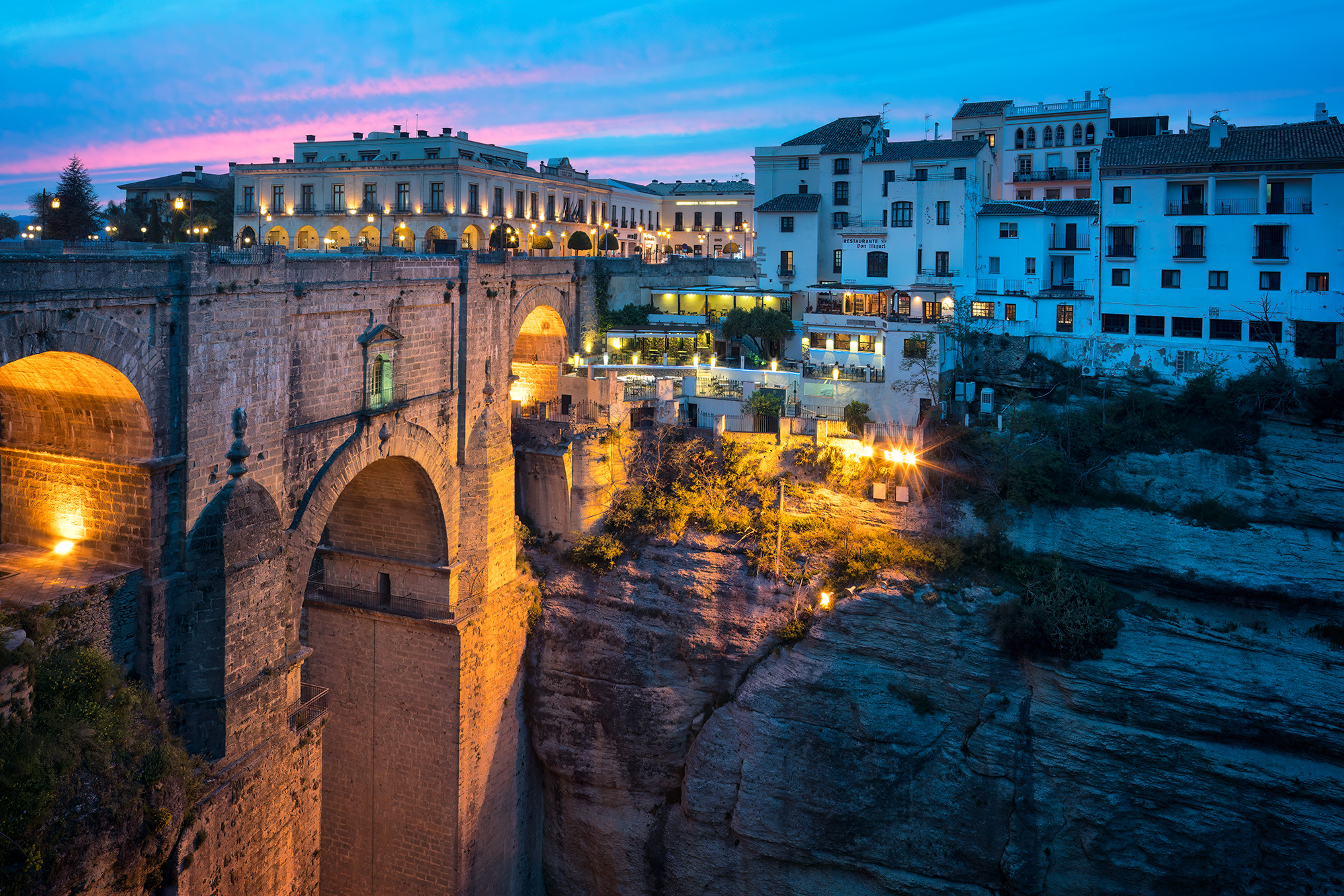 As the day gently faded into the evening's embrace, I captured this enchanting scene during the blue hour in Ronda, Spain. The...