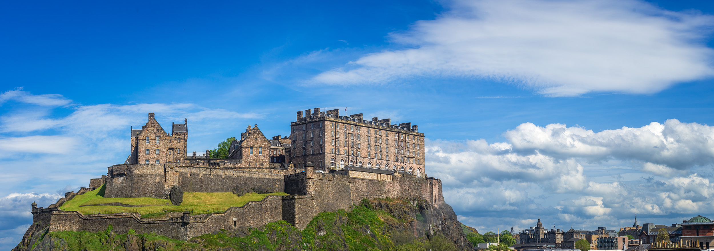 This stitched panoramic image presents the commanding Edinburgh Castle, captured from the window of our room at the Waldorf Astoria...