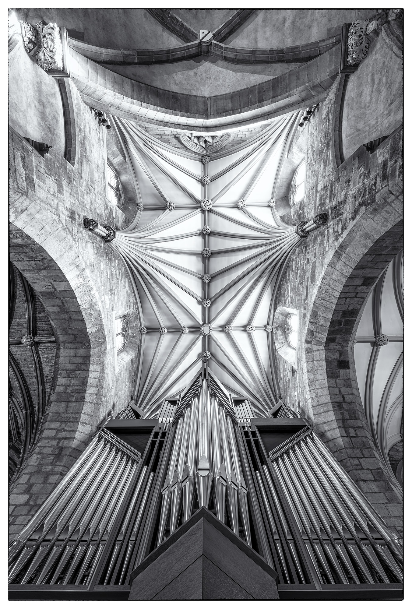 Ceiling Elegance In "Ceiling Elegance," St. Giles Cathedral in Edinburgh, Scotland, reveals its intricate beauty. This black and white image...