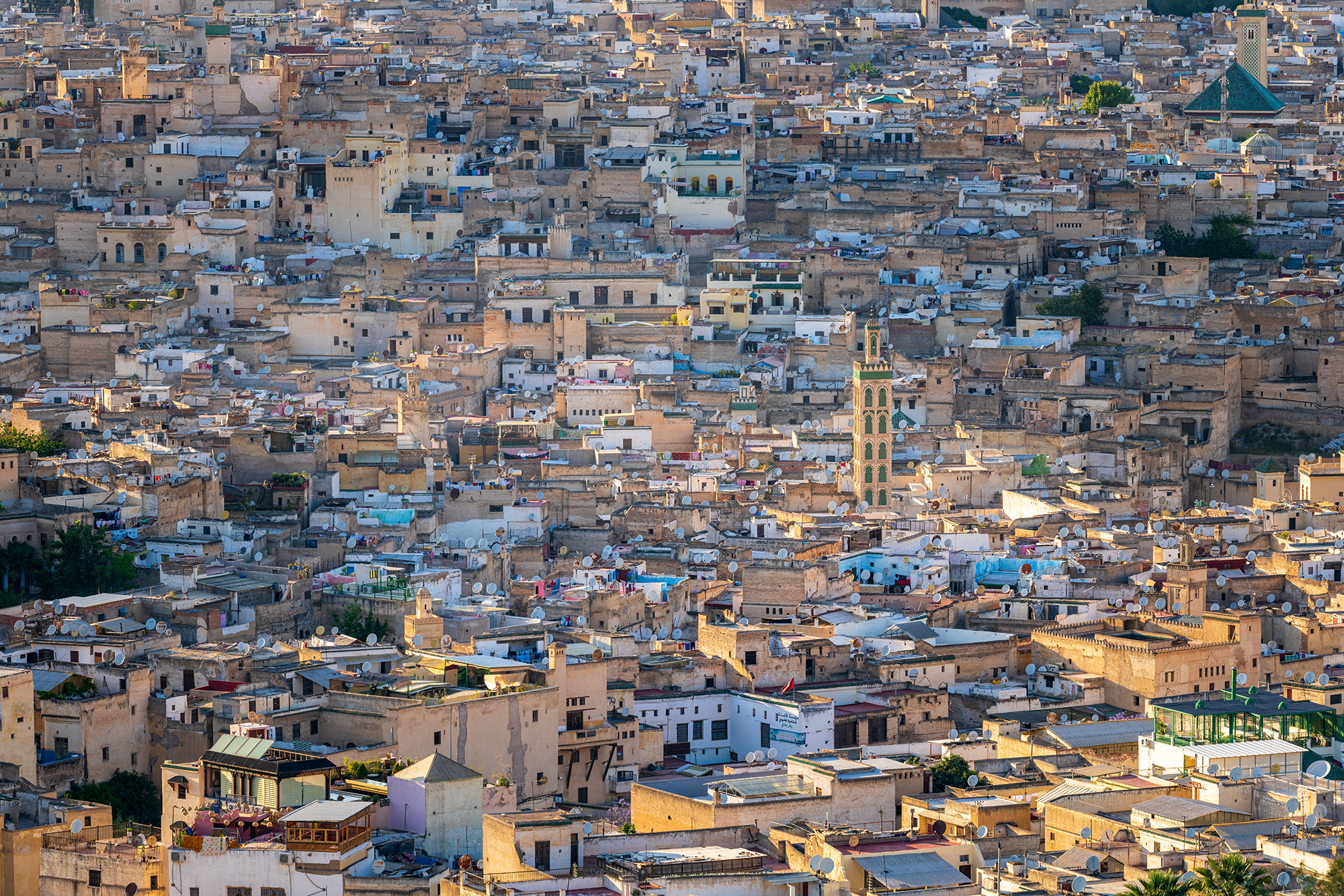 Medina Mosaic This photograph, taken with a Sony 70-200mm lens, provides a distant view of a bustling section of the Fez, Morocco Medina. The...