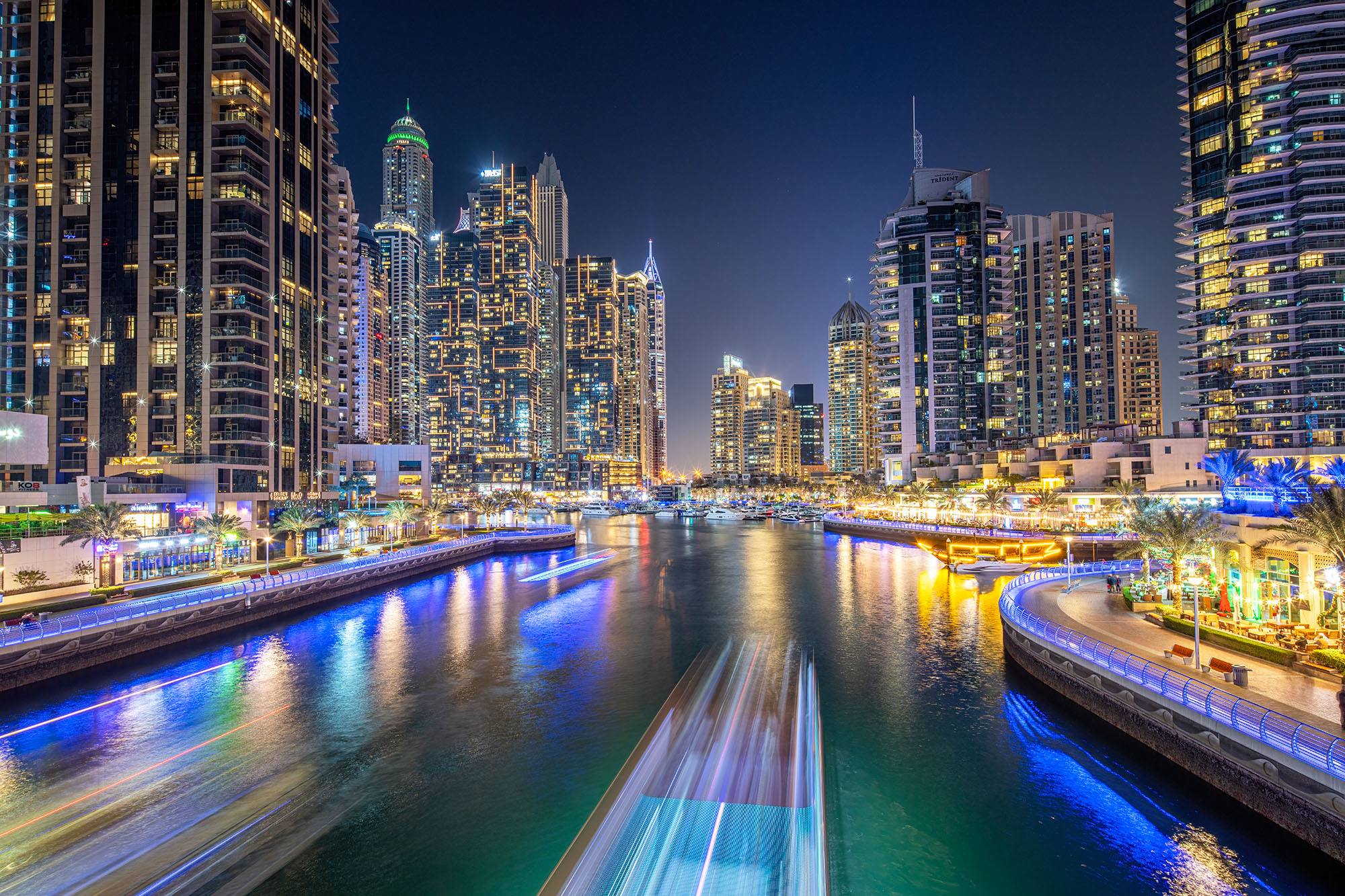 Nocturnal Canalscape Captured during the late stages of the blue hour, "Nocturnal Canalscape" presents a mesmerizing scene from one of Dubai Marina...