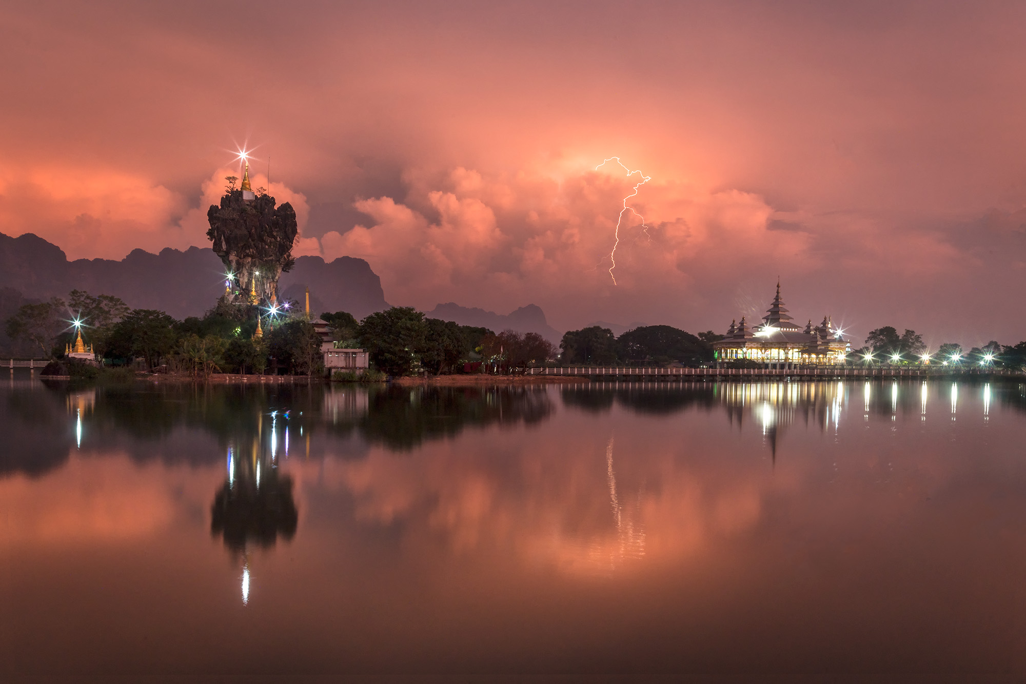 Lightning and Monastery on the Rock People ask me "What kind of camera should I get?" I usually say "Most cameras are the same. Just don't skimp on the ˜glass/lens...