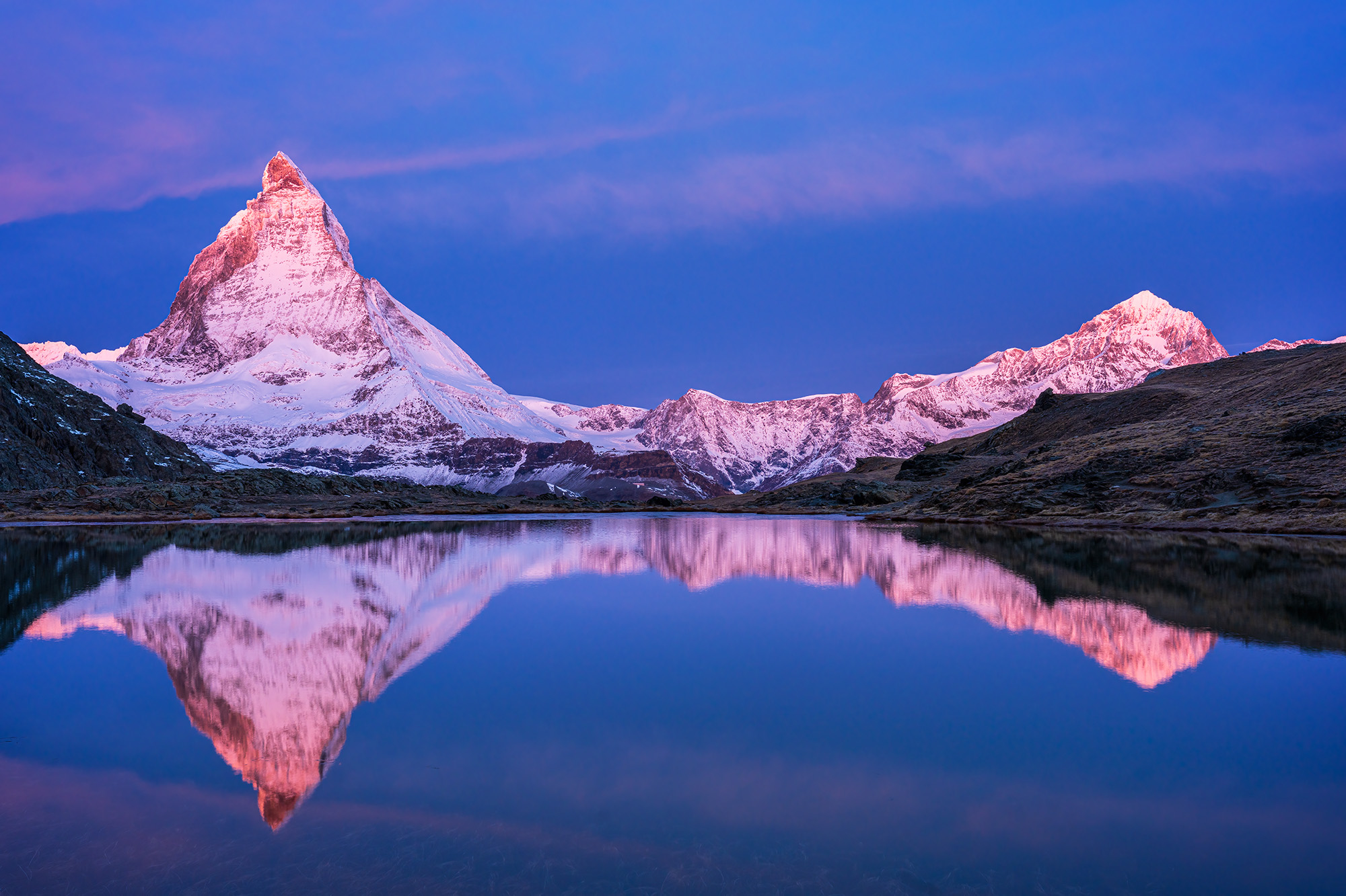 Captured during a frosty journey to the Gornergrat Hotel in Zermatt, Switzerland, "Majestic Reflections" presents a breathtaking...