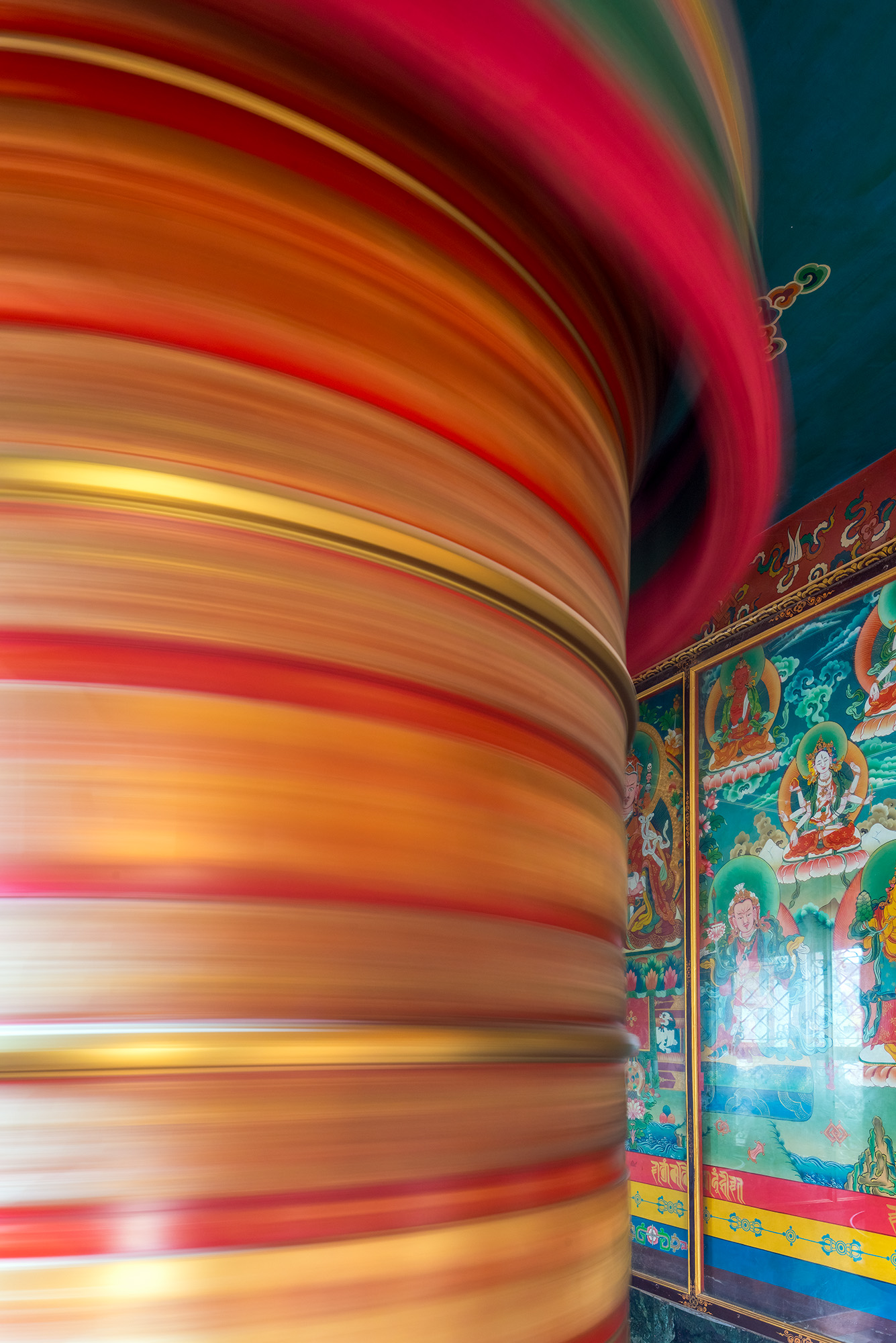 "Spinning Devotion" captures the essence of Kathmandu's Bouddhanath with a towering prayer wheel at its core. Through a long...