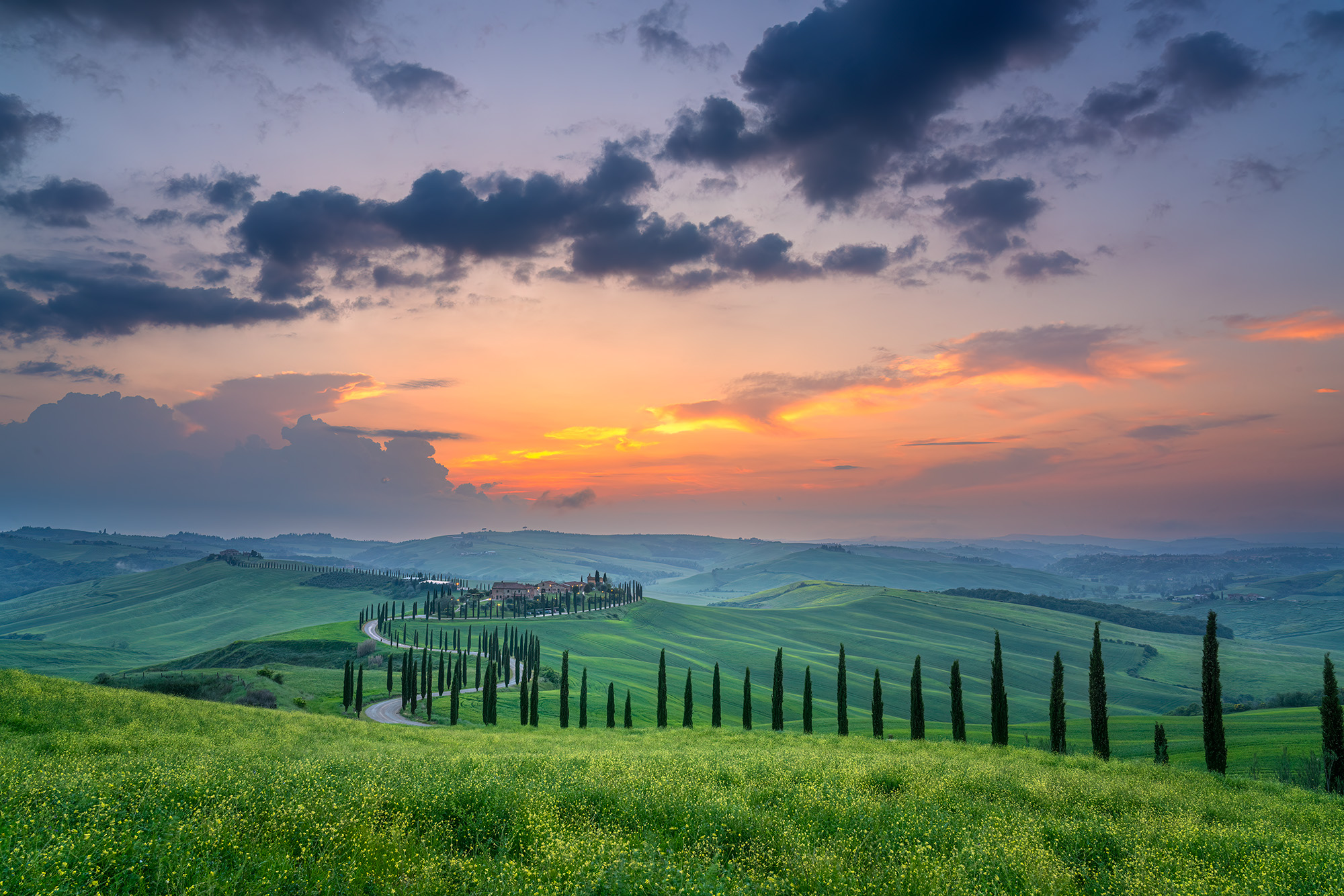 In "Tuscan Sunset Symphony," the enchanting countryside of rural Tuscany is unveiled beneath a brilliant sunset. Rolling hills...