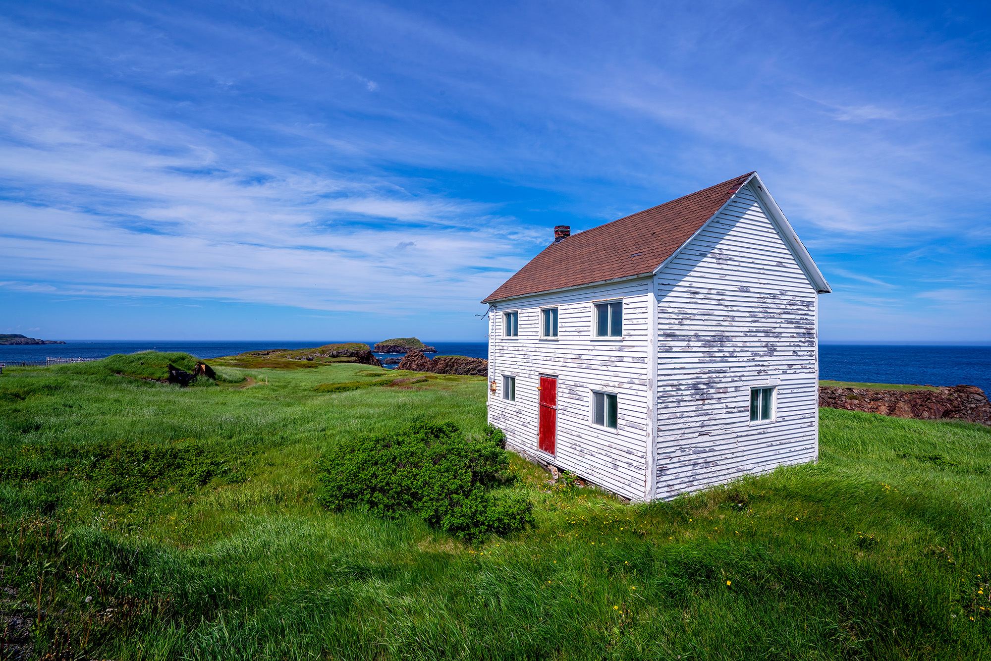 In the picturesque coastal town of Elliston, Newfoundland, simplicity takes center stage in this composition. Three fundamental...