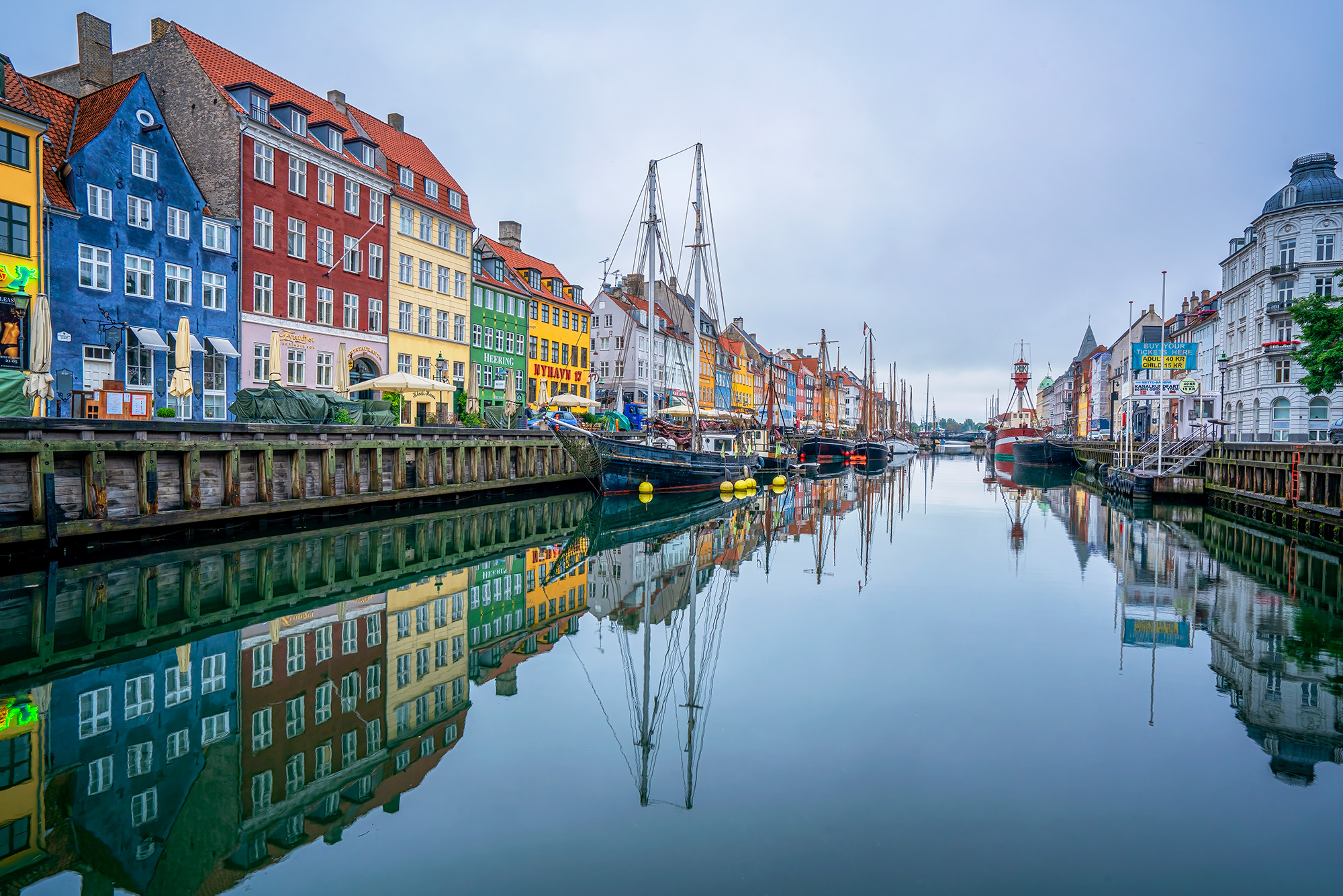 As I captured a photo in the Nyhaven area of Copenhagen, Denmark, I was impressed by the vibrant display of colors and reflections...