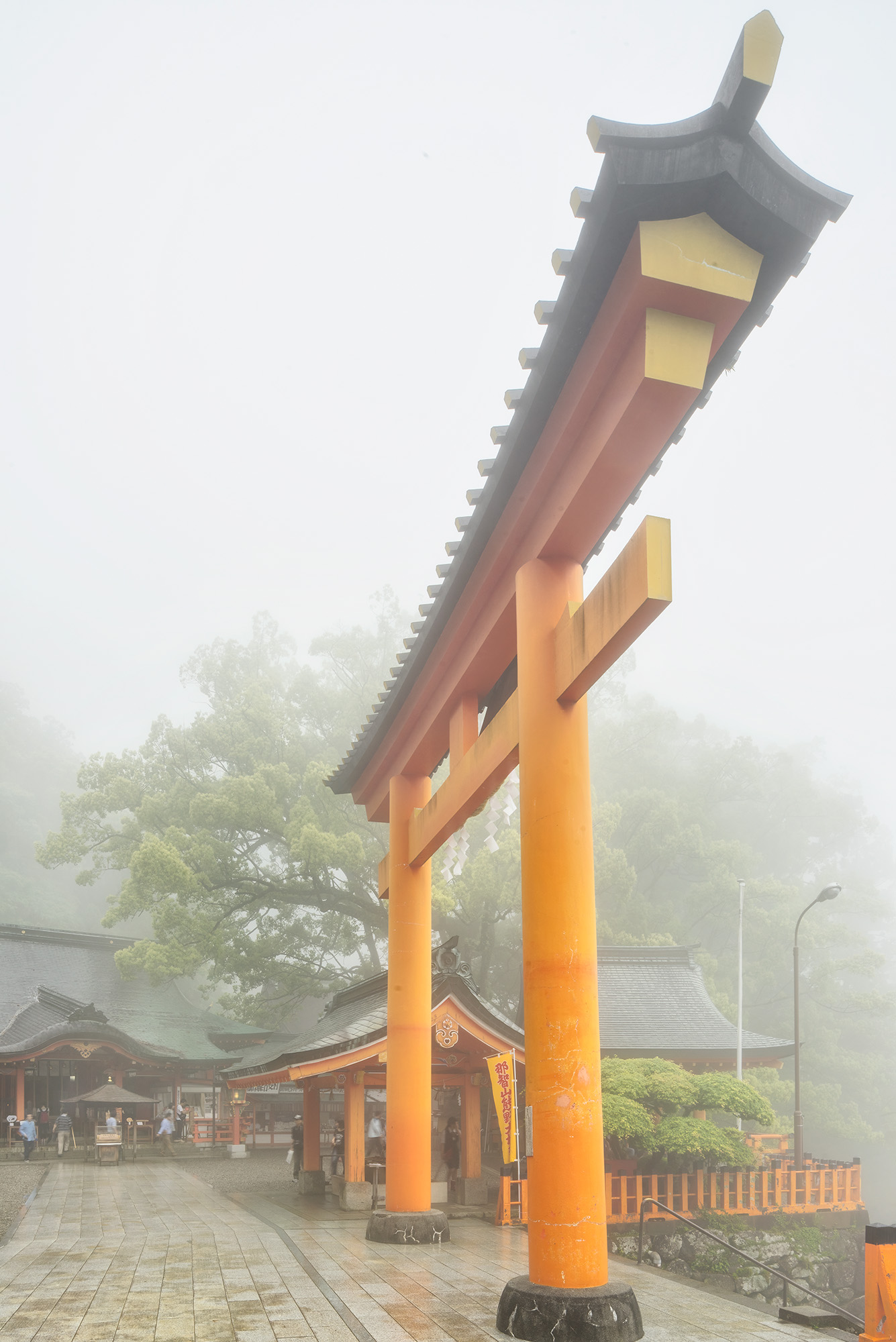Mystical Shroud: Foggy Silence at Seiganto-ji Temple Embracing the ambiance of a rain-soaked day, this image unveils the quiet mystique of Seiganto-ji Temple in Nachisan, Japan....