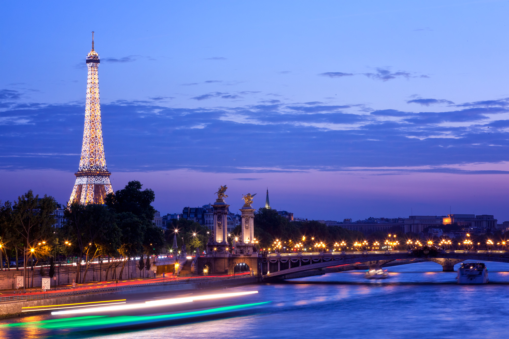 Eiffel's Evening Glow "Eiffel's Evening Glow" captures the enchanting beauty of the Eiffel Tower as it twinkles against the backdrop of a serene blue...