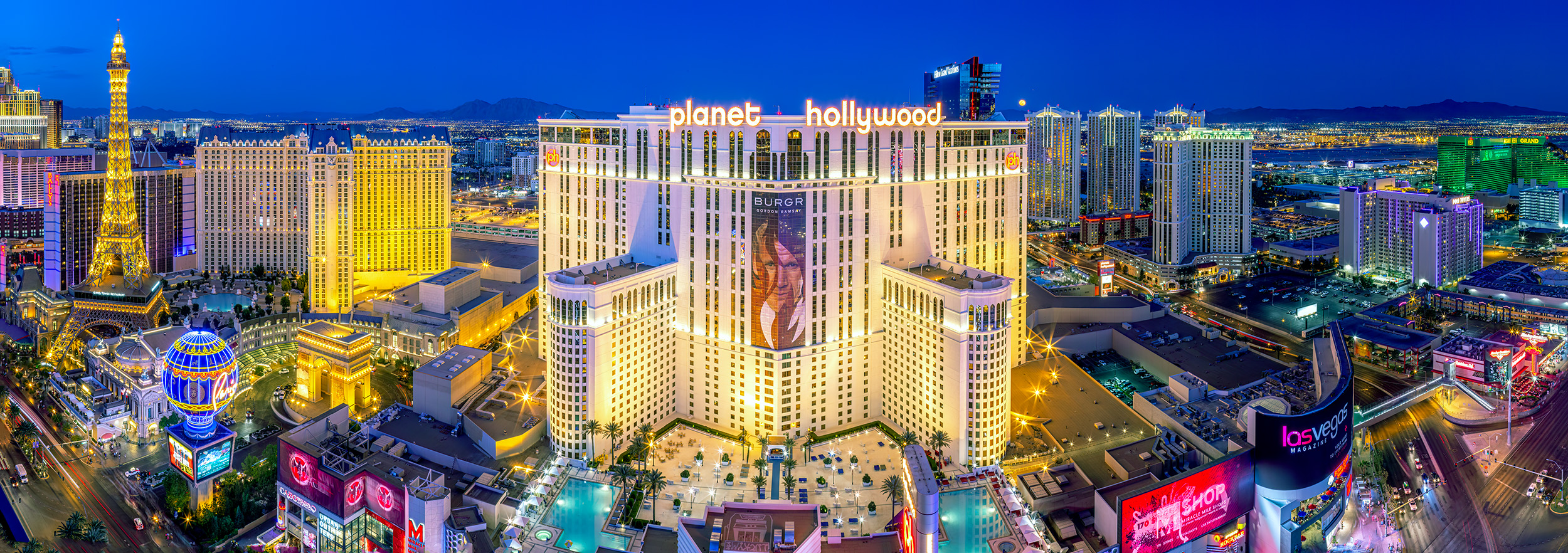 Vibrant Vegas Nights This panoramic image captures the electric energy of the Las Vegas Strip at the enchanting "blue hour." From the 57th floor of...