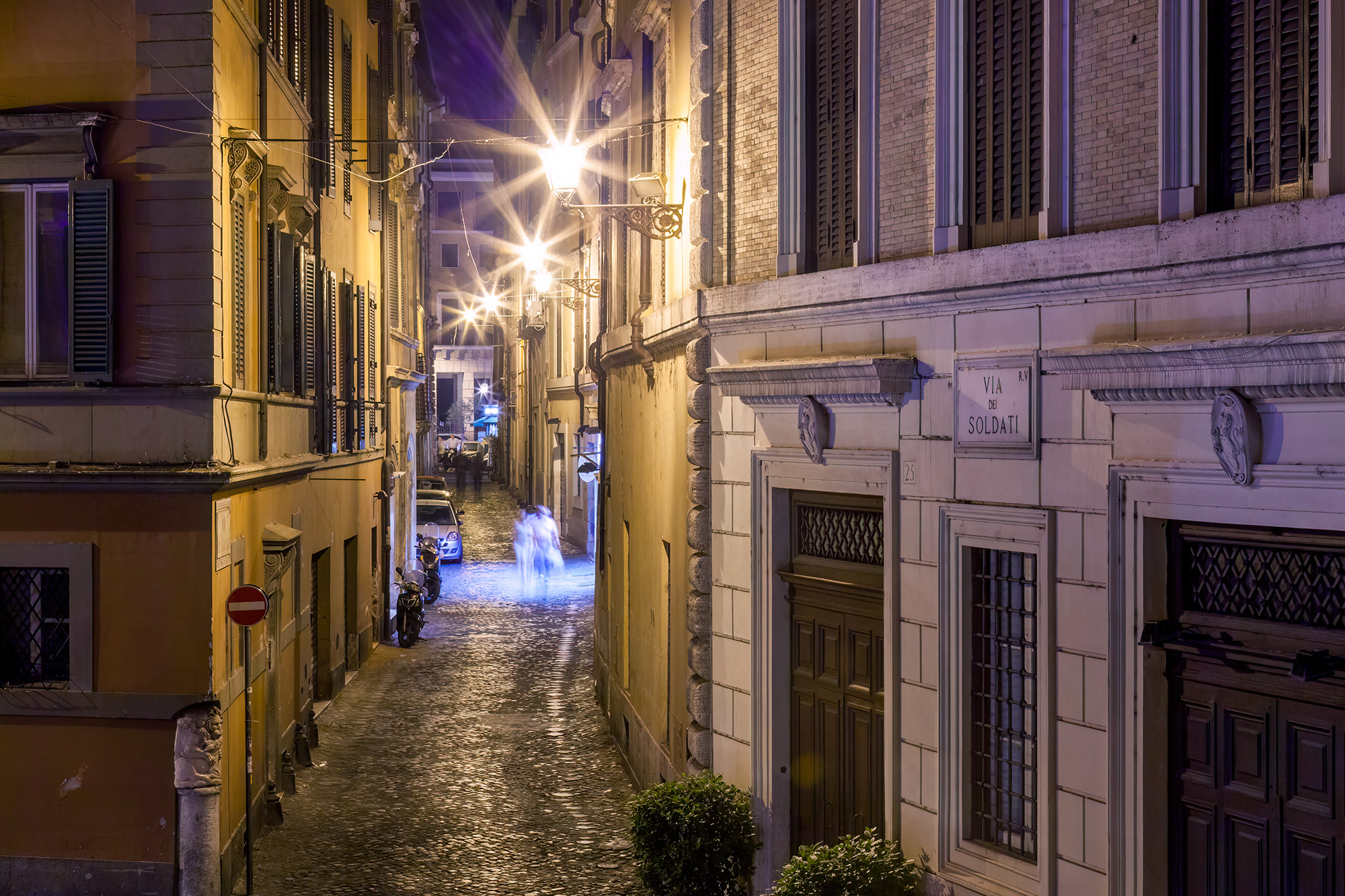 Romantic Night Stroll on Via de Soldati This nighttime image of Via de Soldati in Rome, Italy, paints a scene of charm and romance. A cobbled street stretches ahead...