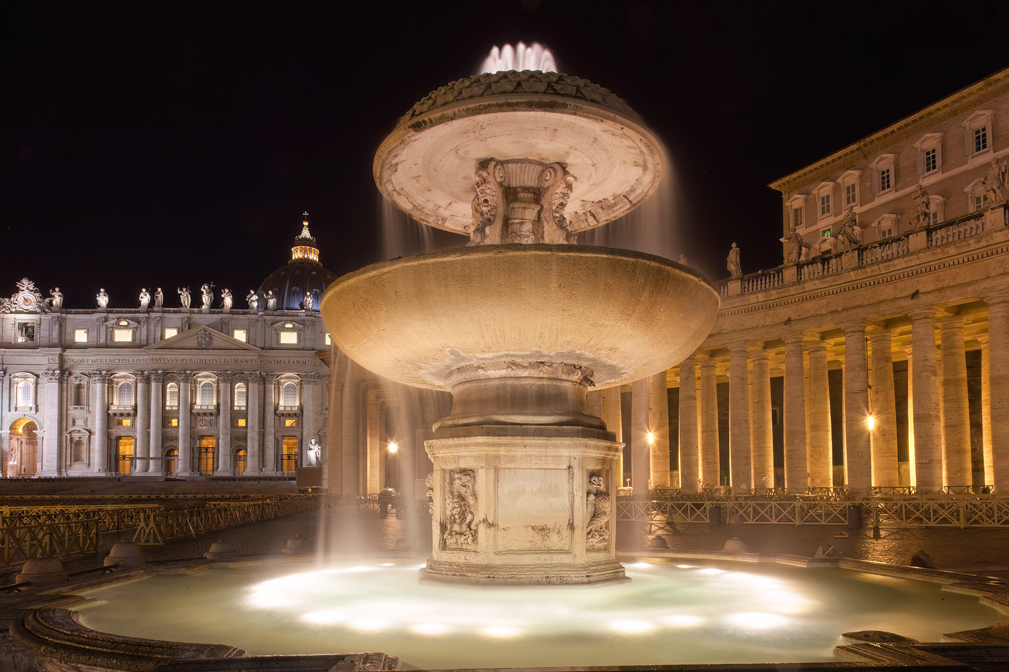 Golden Glow by Vatican's Fountain On a quest for a taxi stand in Rome, Veronica and I ventured quite a distance, eventually landing at the Vatican. In the nocturnal...