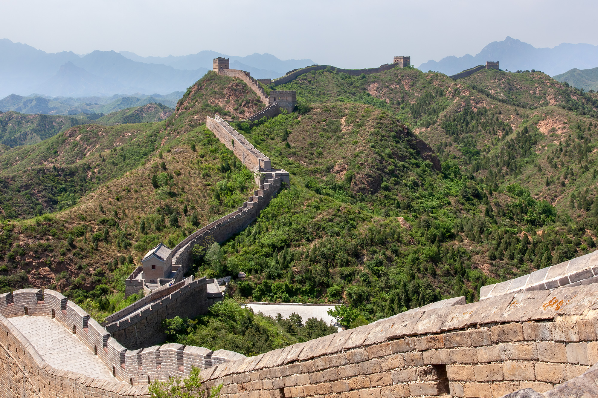 Great Wall of China This image, captured during my hike along China's Jingshaling Section of the Great Wall, reveals a breathtaking panorama. Stretching...