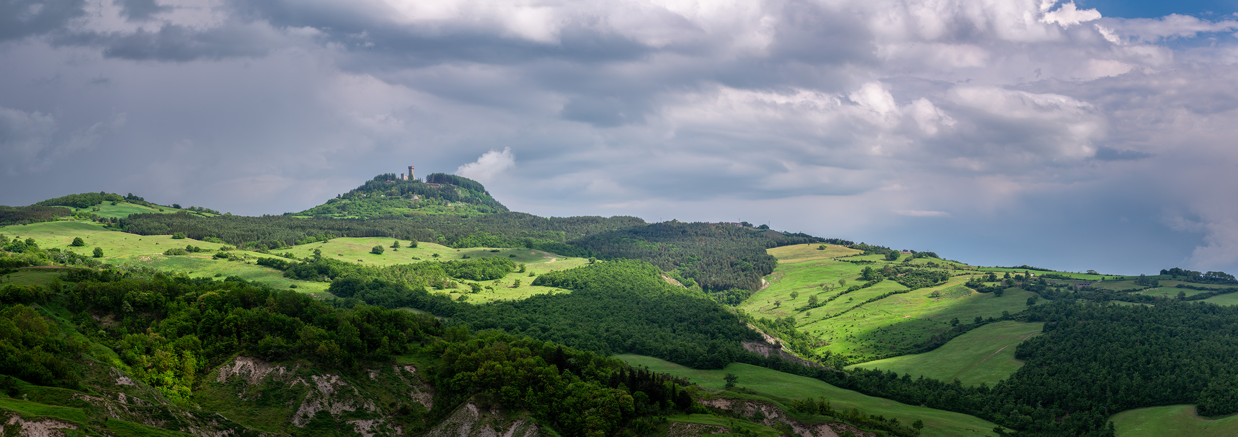 Driving through the picturesque Tuscany countryside I was amazed at the surrounding countryside.  This panoramic image stitches...