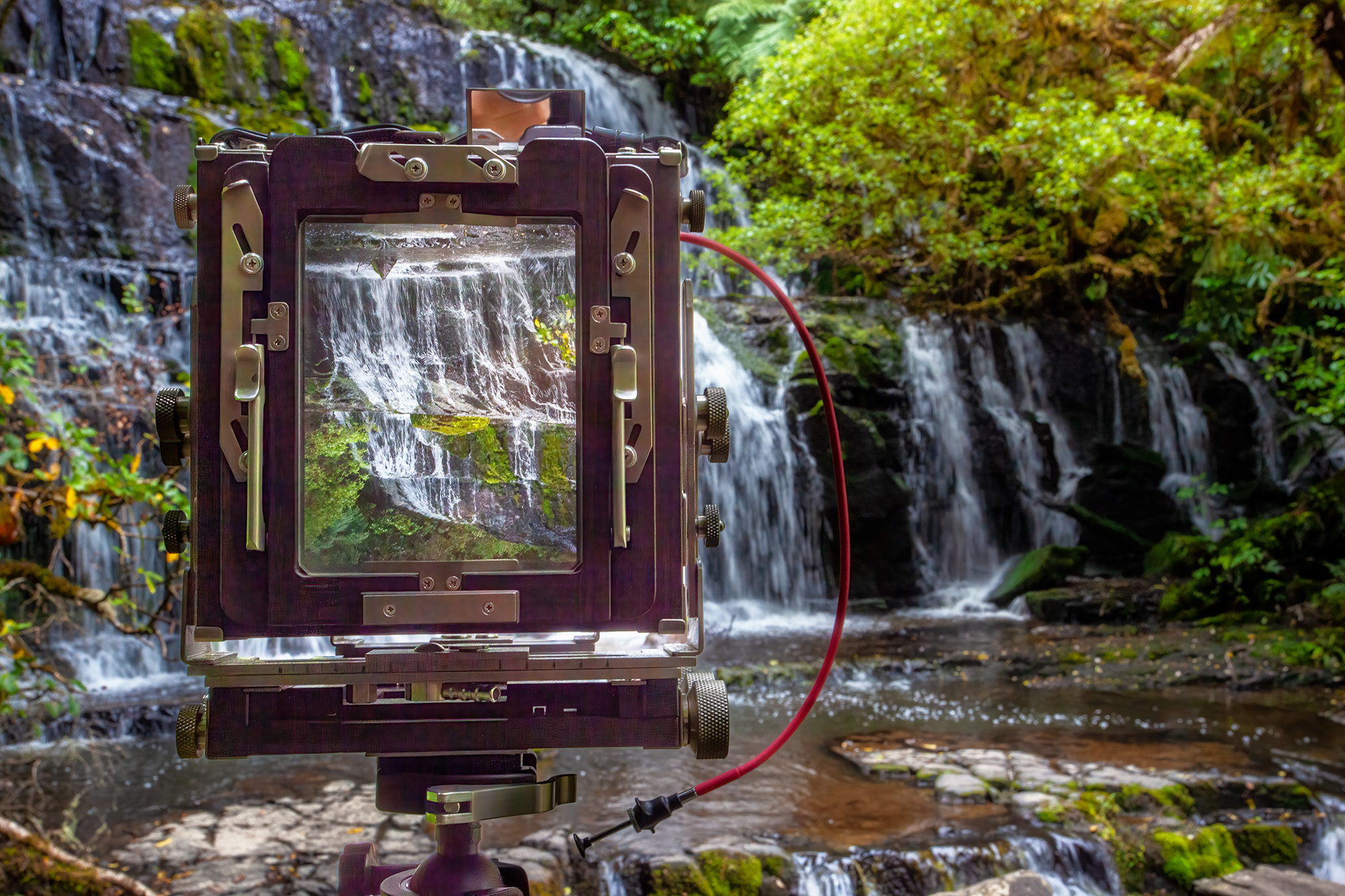 In this cherished image, my Ebony SV45Te Camera stands poised for action, ready to capture the magic of a waterfall. The photograph...