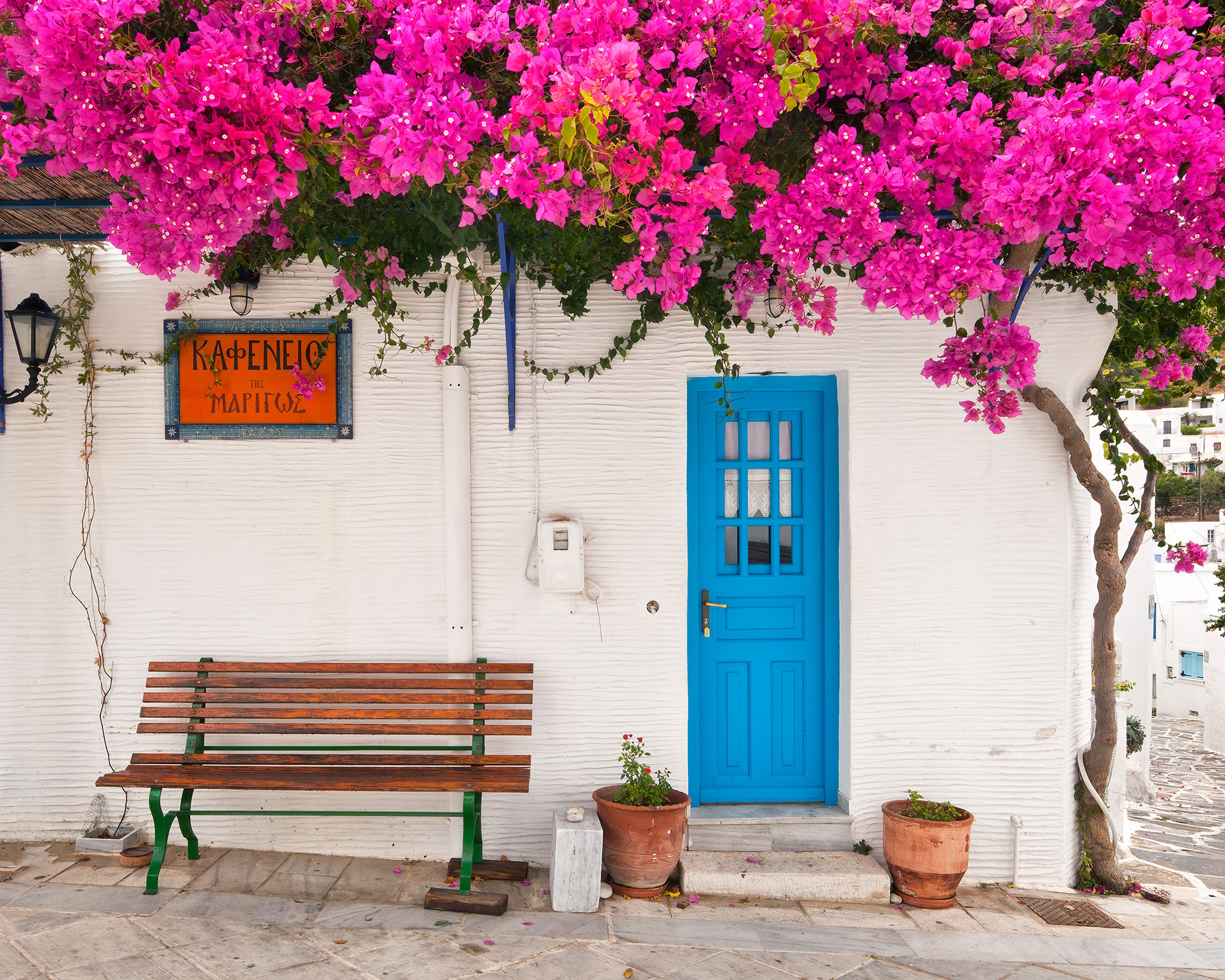 Tree and Bench In the picturesque town of Lefkes, nestled on Paros Island, Greece, I stumbled upon a delightful café. A refreshing change from...