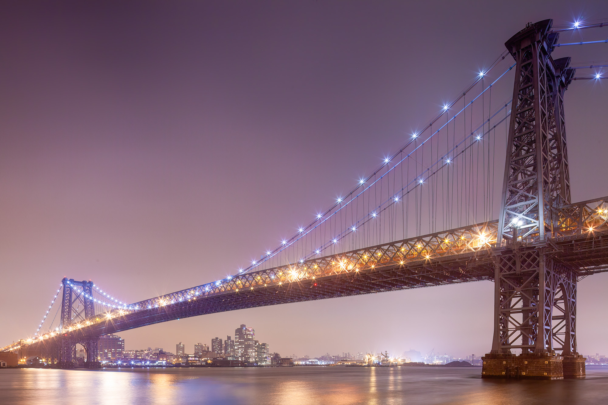 Amid the nocturnal glow of New York City, I captured the Manhattan Bridge in all its luminous splendor. Its majestic presence...