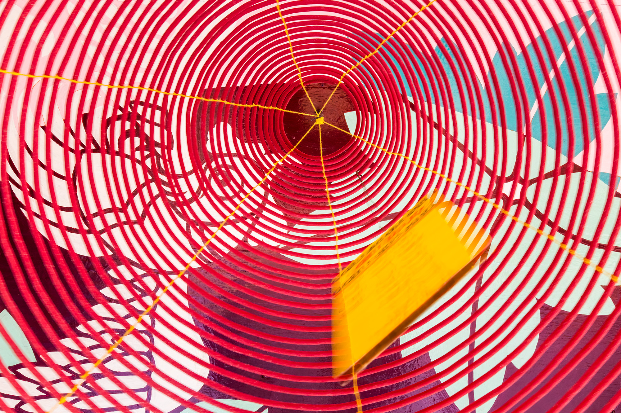 Red Incense Spiral's Avian Silhouette This image invites you to gaze up through a traditional red coil incense spiral, revealing a striking surprise. Amidst the spirals...