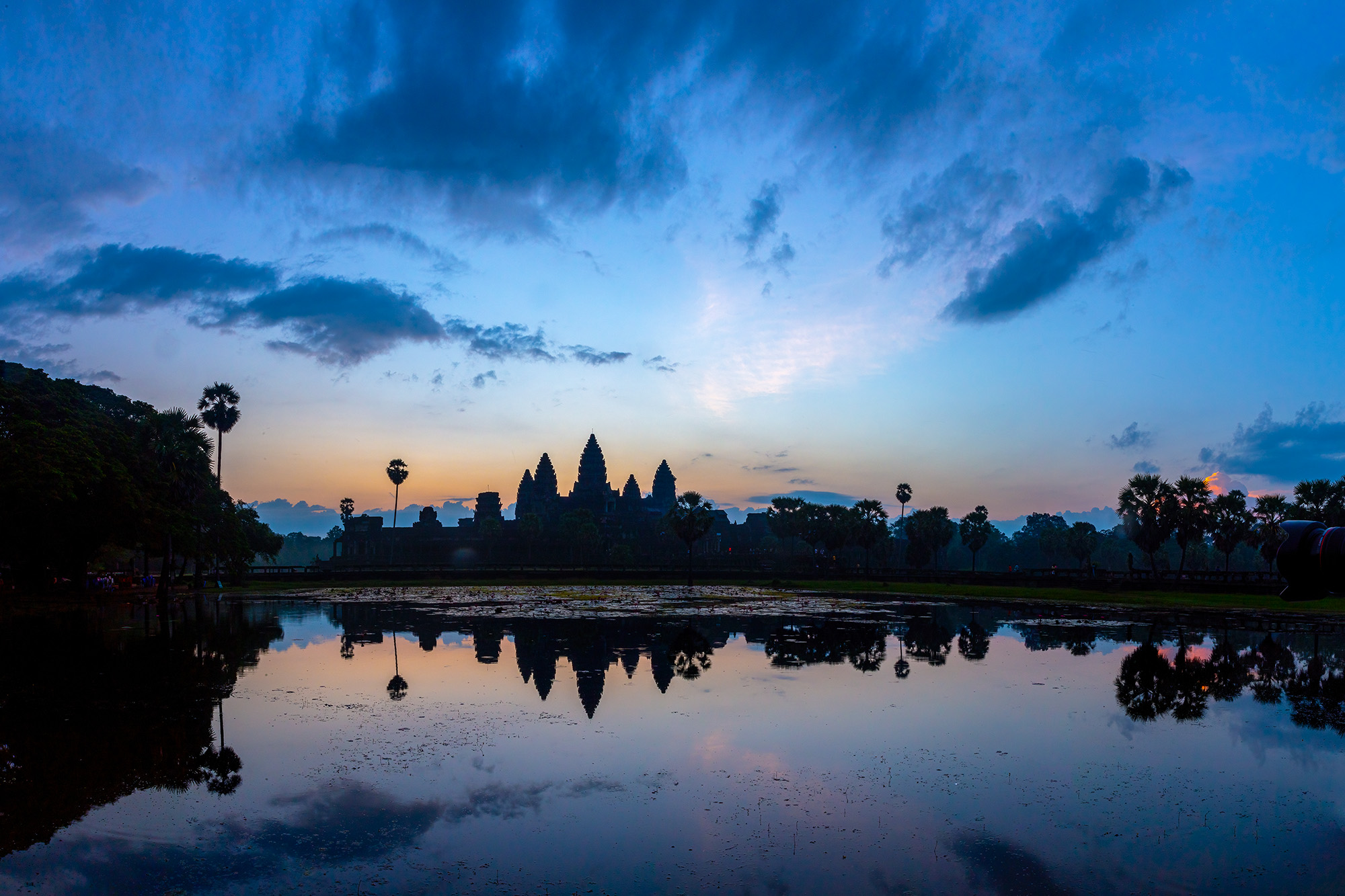 Arriving at Angkor Wat before sunrise, I embraced the serene darkness, ready to capture the reflections. As the sun gradually...