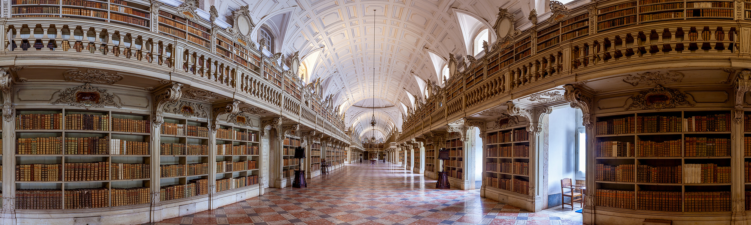 The Mafra Library, housed within this magnificent palace/monastery, is truly breathtaking. Capturing this awe-inspiring scene...