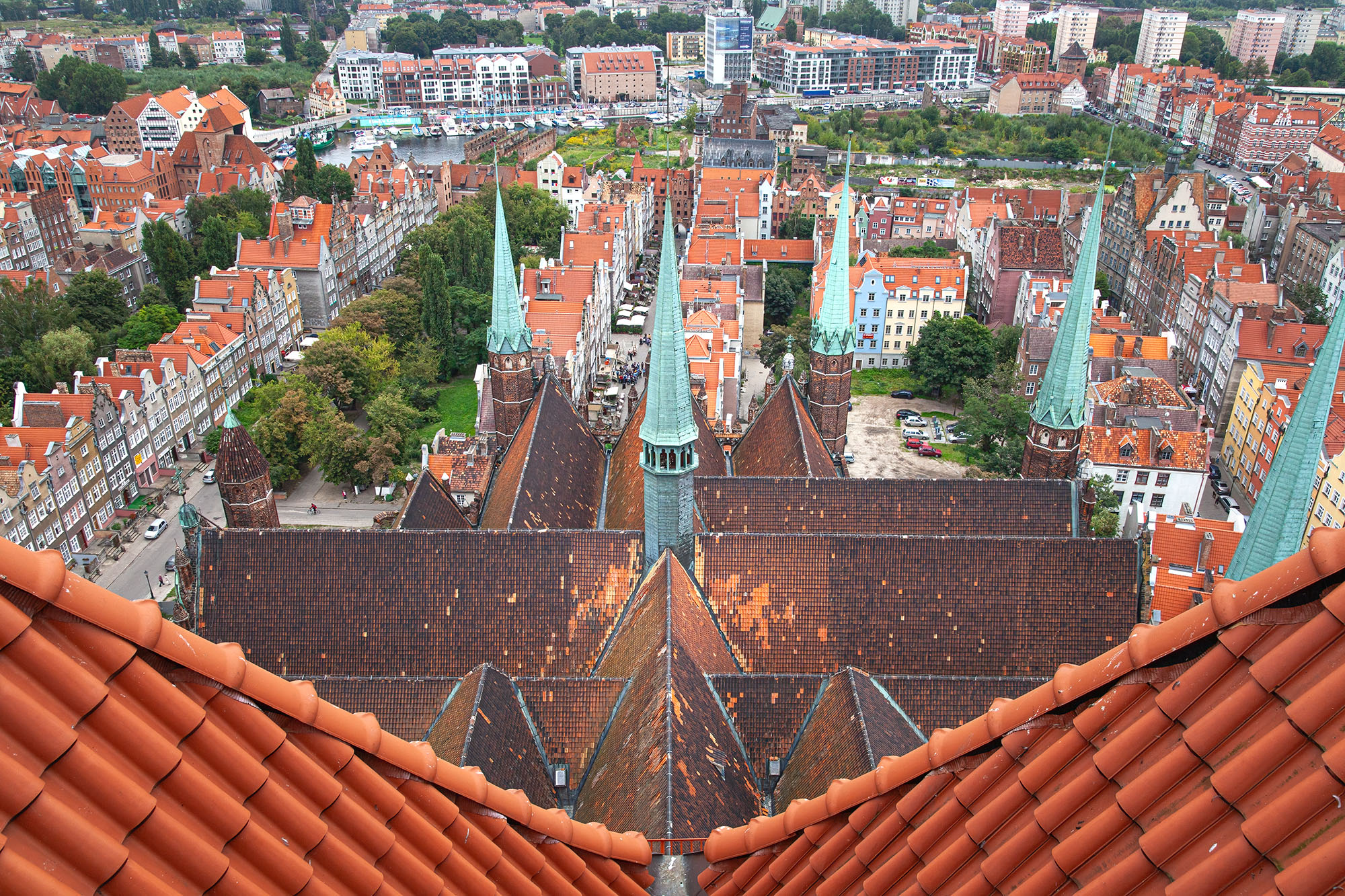 Panoramic Glimpse from St. Mary's Tower This image offers a breathtaking panoramic view captured from atop St. Mary's Tower in Gdansk, Poland. From this elevated vantage...