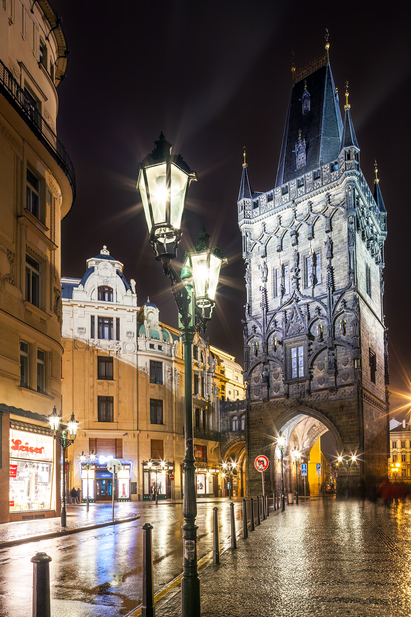 Rainy Night at the Powder Tower In the heart of Prague, under a drizzling rain, the historic Powder Tower stands as a sentinel to bygone eras. This 15th-century...