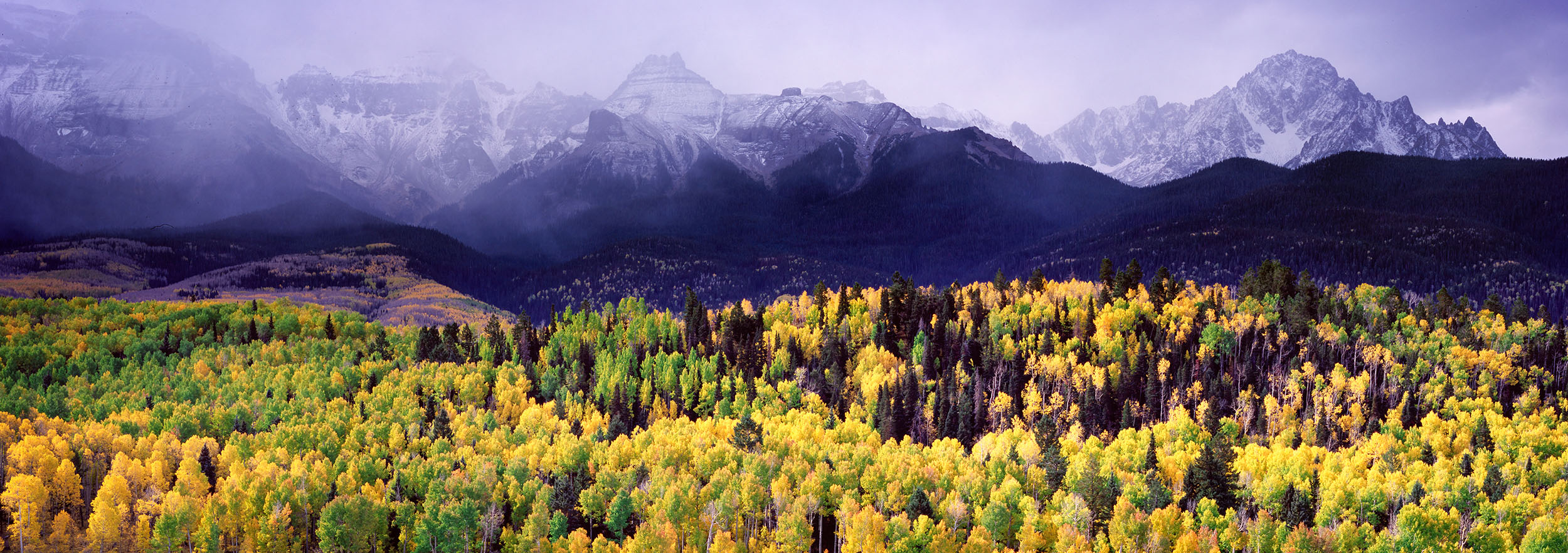 Mighty San Juan Storm Amidst the rugged beauty of the San Juan Mountains, this panoramic image captures a scene where nature's artistry unfolds. Storm...