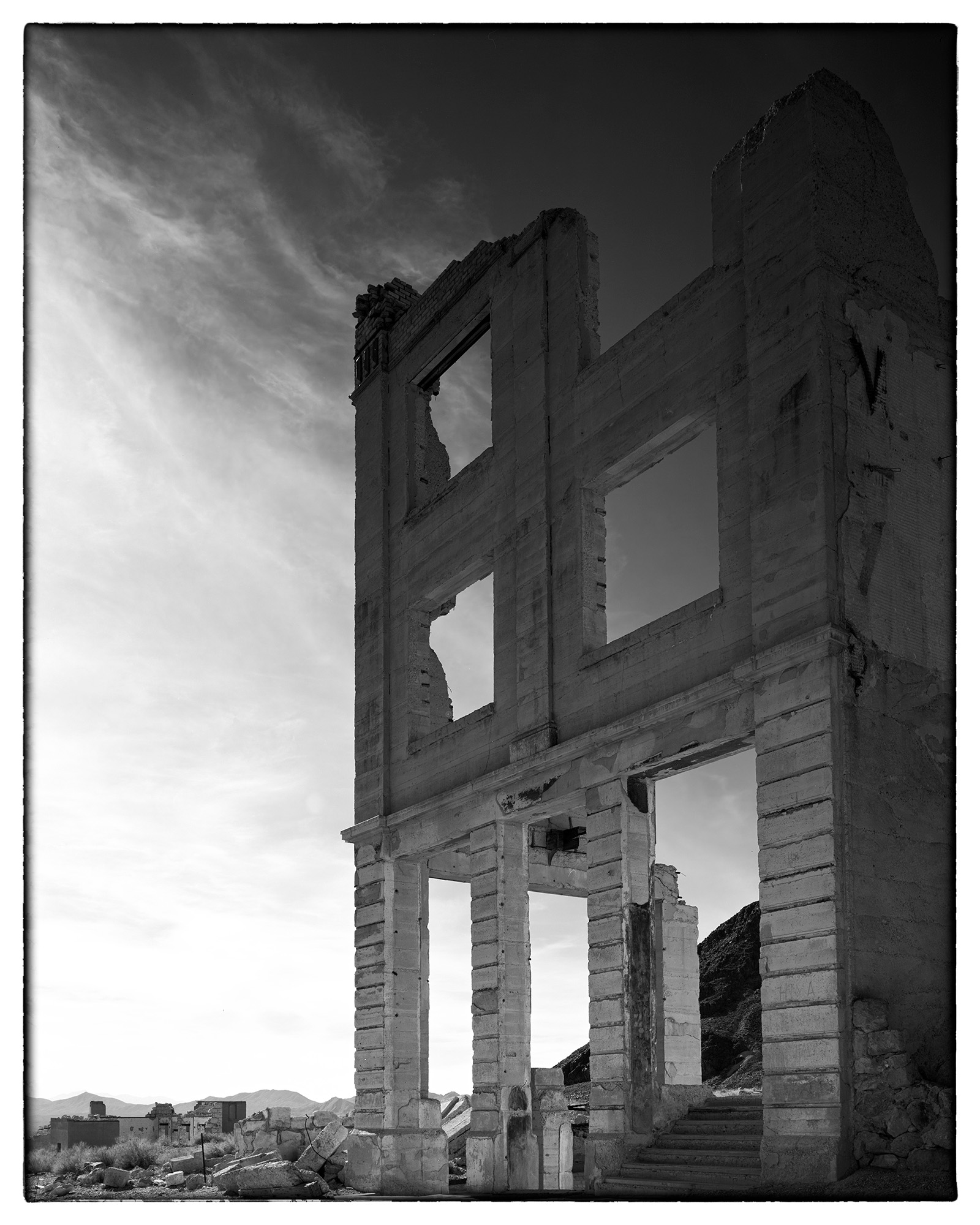 Captured on Kodak TMax film with my Ebony SV45Te View Camera, this vertical image offers a haunting glimpse of Rhyolite, Nevada...